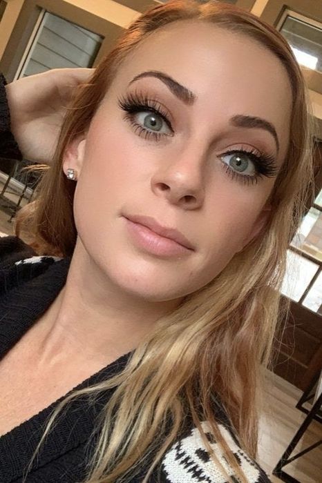 A reviewer sporting winged black liquid eyeliner.