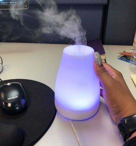 Image from a reviewer showing the diffuser placed on a desk
