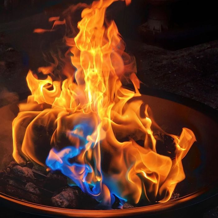 Reviewer's fire burning with vibrant, colorful flames