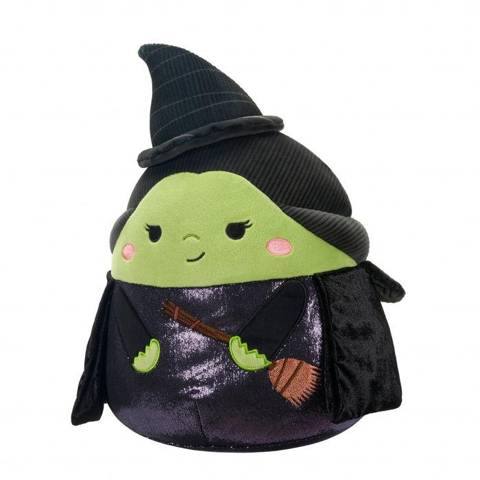 A plush witch character complete with a pointed hat, broom, and a friendly grin, featured in a shopping list
