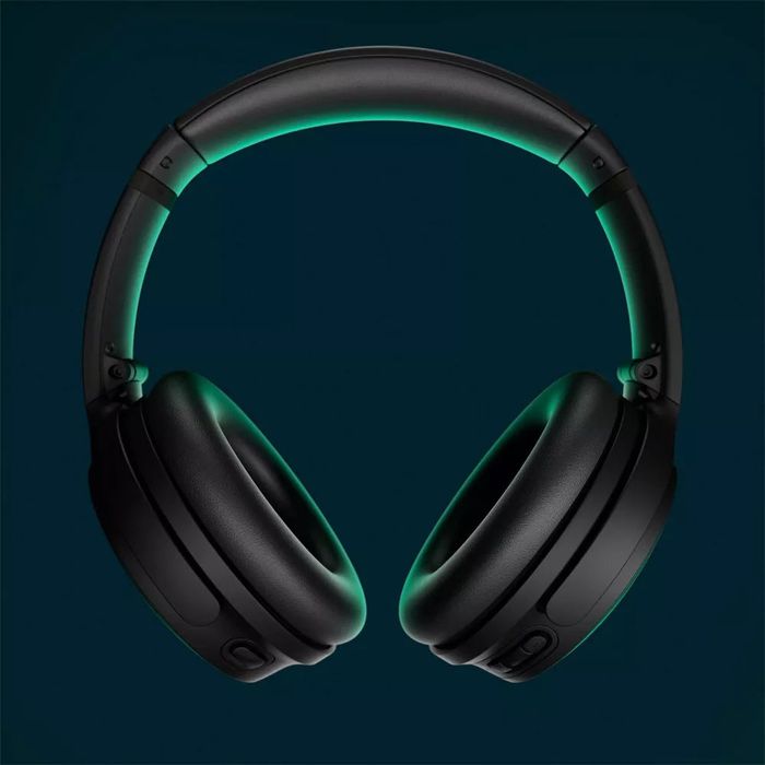 A sleek, black pair of over-ear headphones with cushioned ear cups, showcasing a modern and stylish design for a premium listening experience.