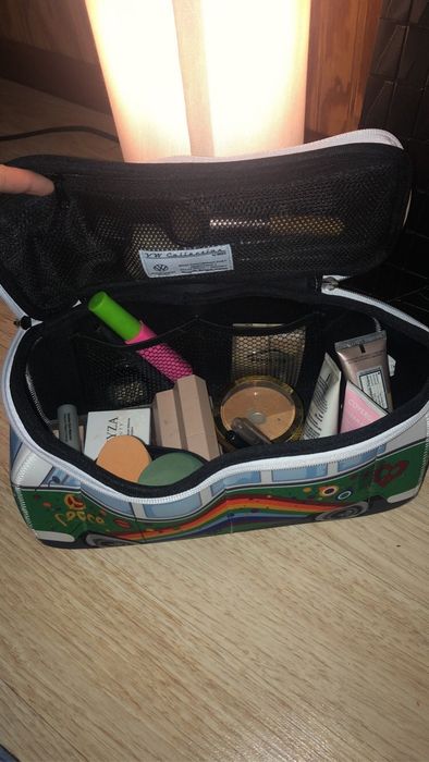 Reviewer photo showcasing makeup items inside the bag