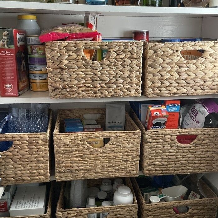 A reviewer's image showing the baskets in use for organizing household items.
