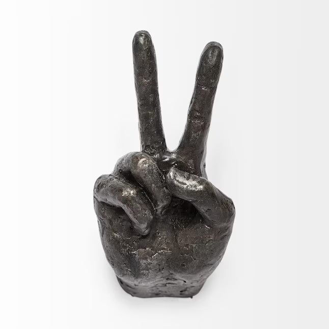 A sculpture of a hand forming a peace sign, highlighted in a shopping feature