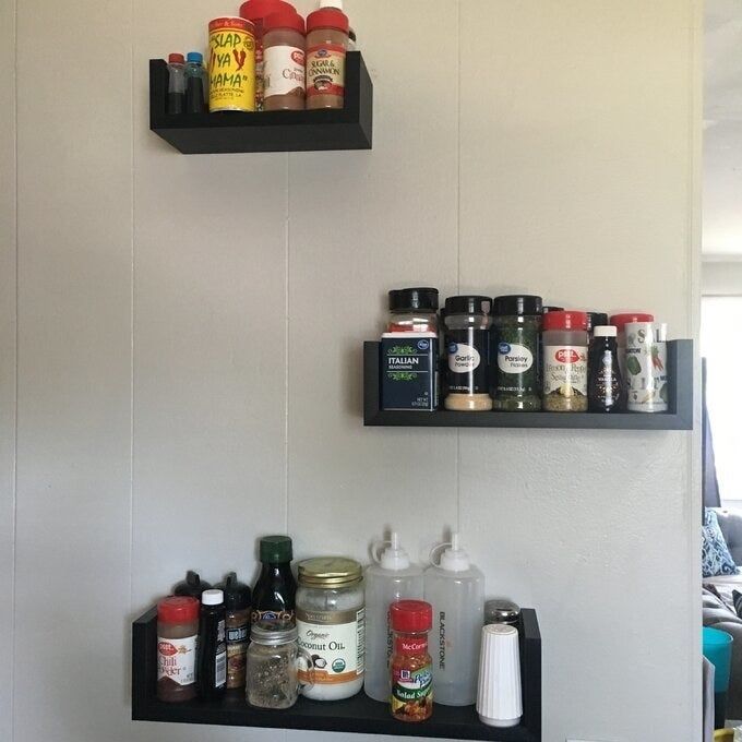 Another reviewer's image showing the shelves holding their collection of spices