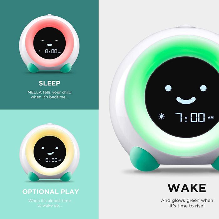 The clock features three distinct light modes and clear labels indicating when it's time to sleep, play, or wake up