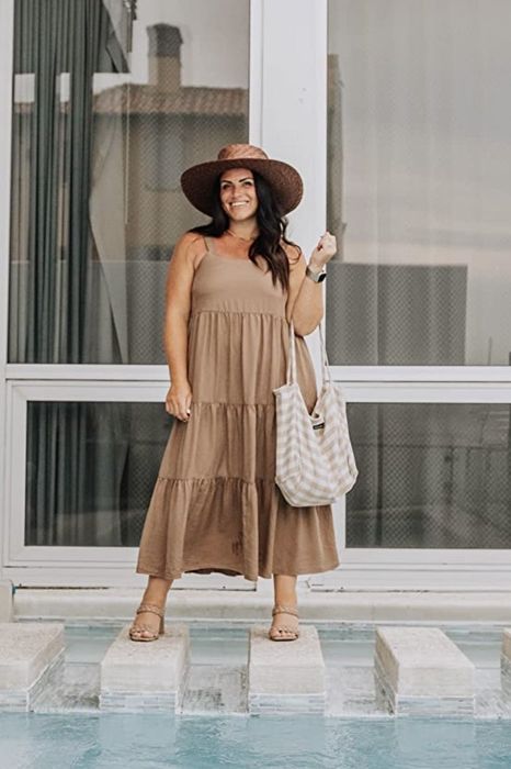 A reviewer wearing the dress.