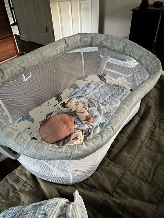 the editor's baby resting in a Halo bassinet