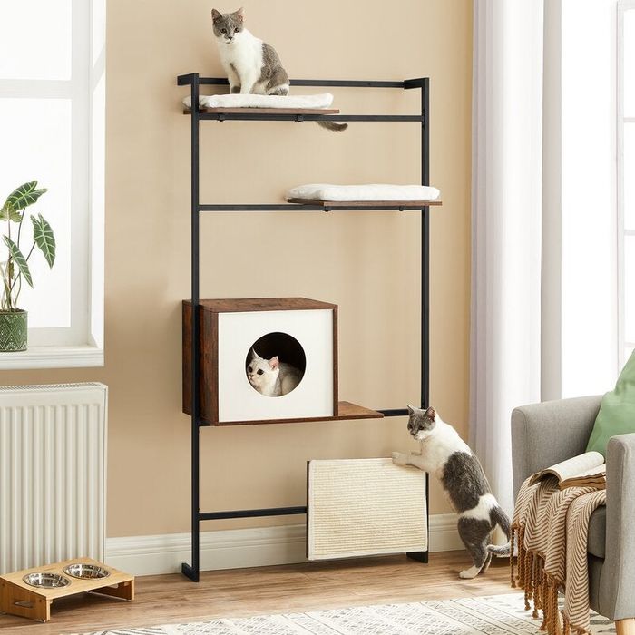 Three cats enjoying the multilevel cat tree.