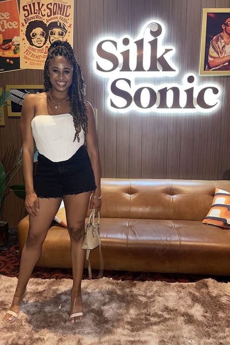 a customer showcasing the white top