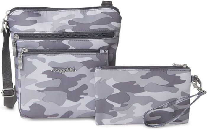 Three Baggallini bags with a stylish gray camouflage pattern, presented for shopping. The set features a crossbody bag, a small pouch, and a wristlet.