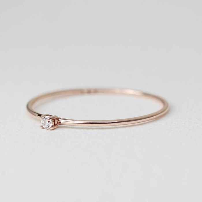 A close-up shot of the dainty ring showcasing its minimalistic beauty
