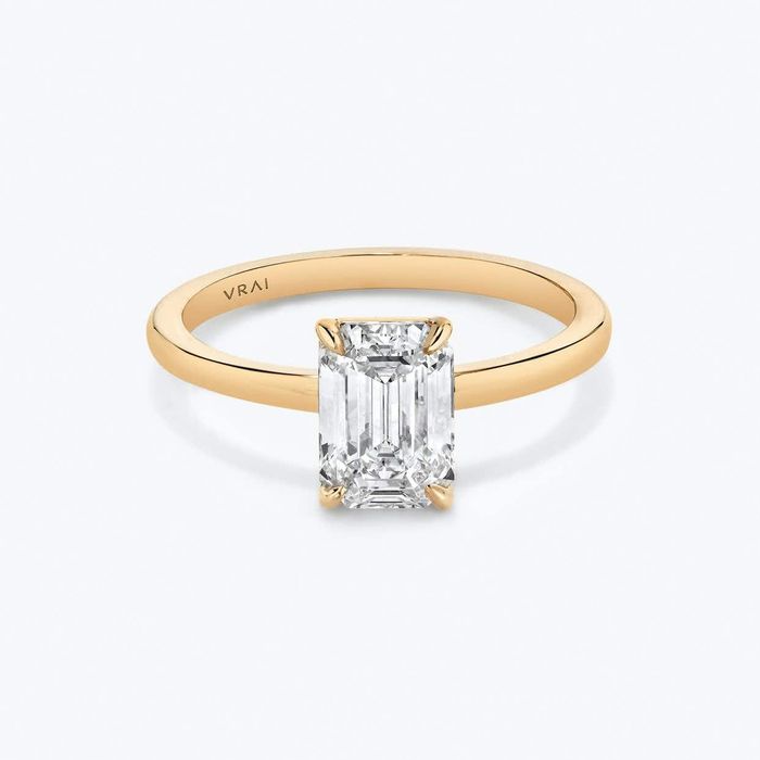 The striking emerald-cut ring that captures attention with its dazzling pave design