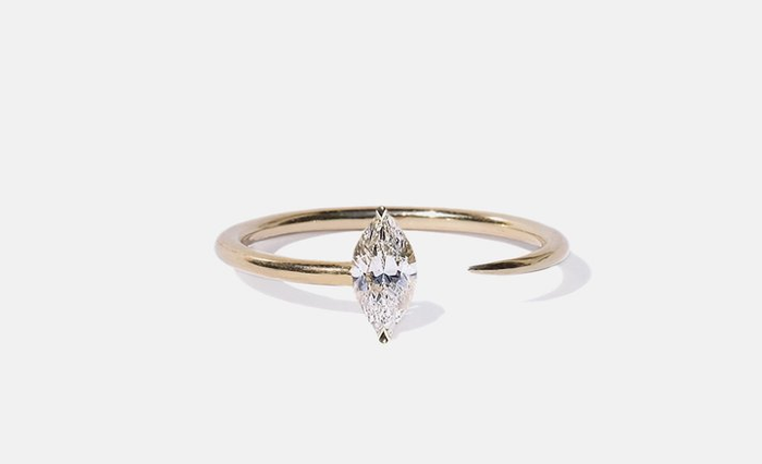 a Marquise diamond set on a band with no connection in the center
