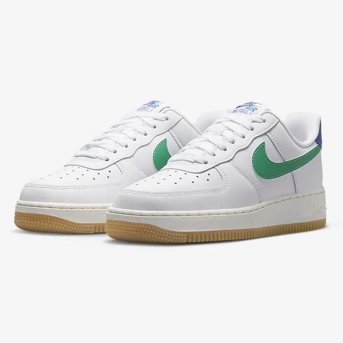 Image of a white and green sneaker.