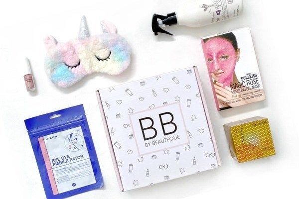 various items such as a face mask, pimple patches, and a unicorn-themed eye mask
