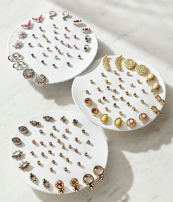 various sets featuring 20 pairs of studded earrings