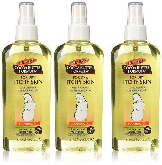 Bottles of Palmer's Cocoa Butter Formula Soothing Oil, designed to nourish and hydrate the skin.