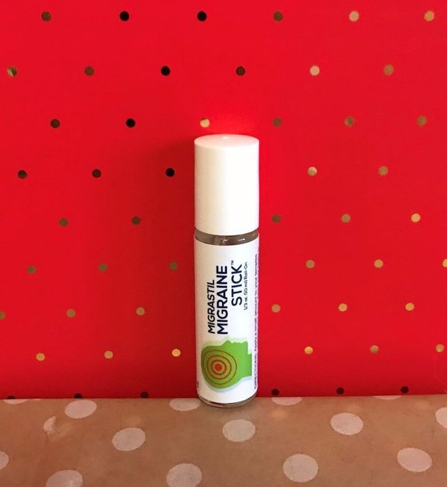 A reviewer's Migrastil Migraine Stick, showcasing its compact and practical design.