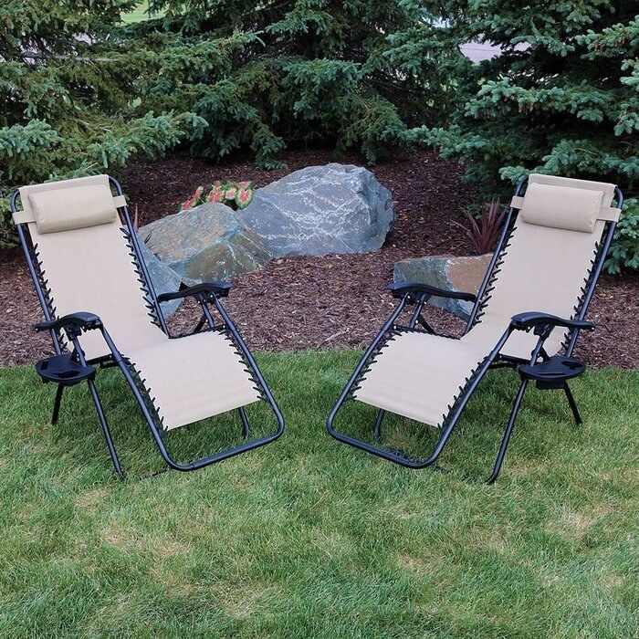 Two high-backed chairs featuring built-in footrests, with fabric suspended by heavy-duty elastic for maximum comfort.