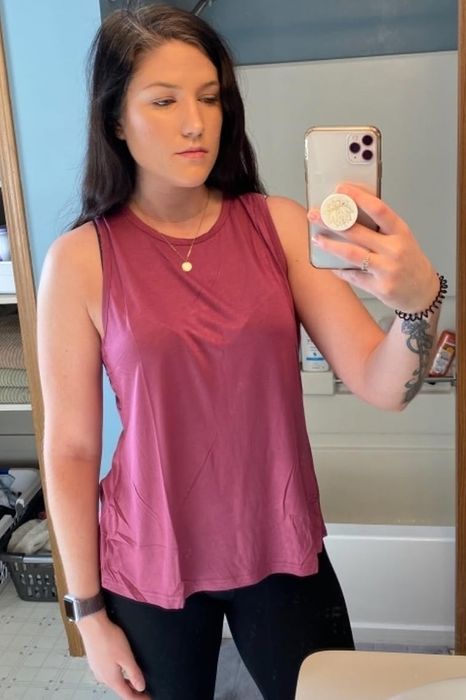 A reviewer modeling the shirt