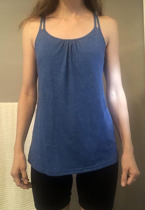 A reviewer showcasing the shirt