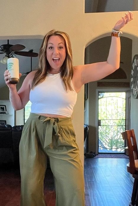A reviewer wearing the tank