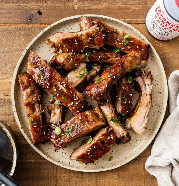 The rich sauce drizzled over a tempting plate of ribs