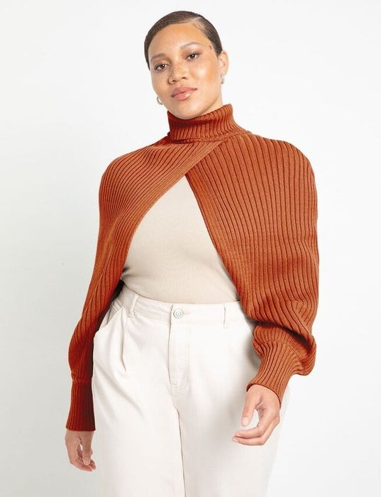 A model wearing a brown turtleneck sweater scarf