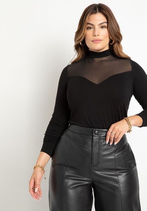 A model wearing the black version of the top