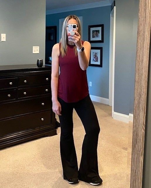 A reviewer modeling the shirt