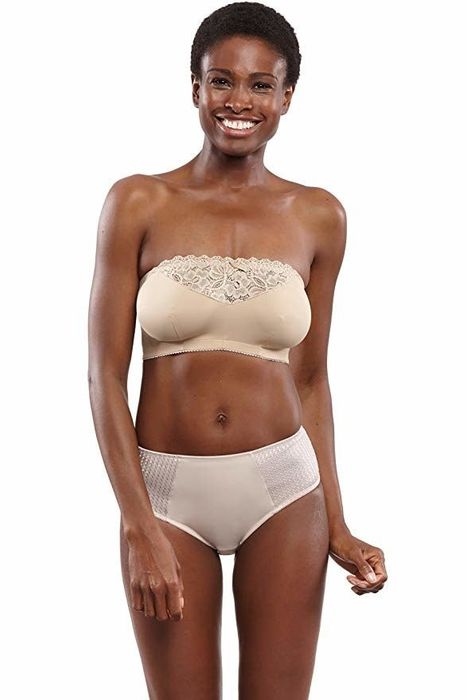 A model showcasing a strapless bra paired with matching underwear