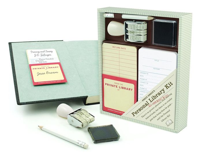 The complete kit along with a book marked with a library card