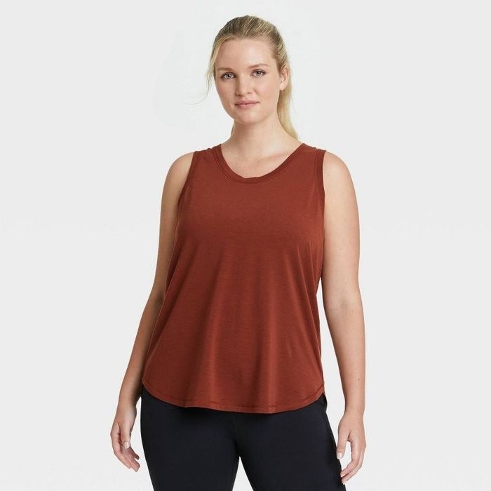 Model rocking the russet active tank top
