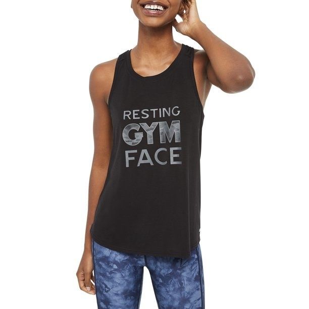 A model wearing the tank that reads