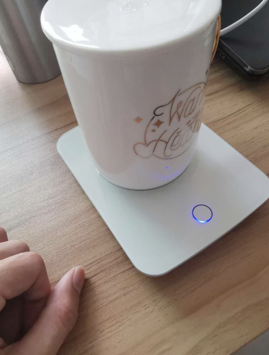A coffee cup warmer to keep your drink at the perfect temperature.