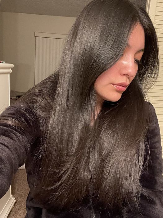 Reviewer's hair after styling with the brush