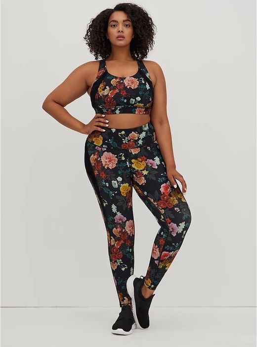 Front view of the model wearing the floral leggings