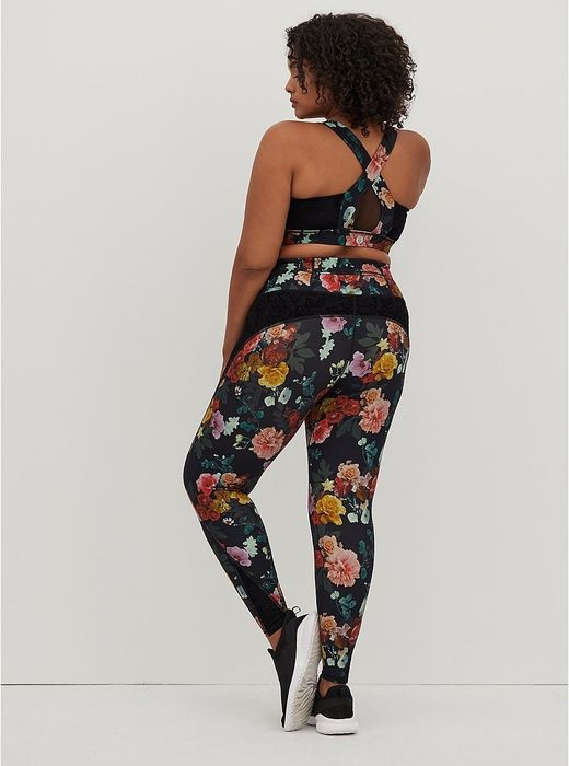 Back view of the model wearing the floral leggings