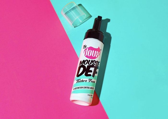 A bottle of hair mousse