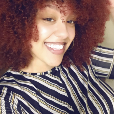 Photo of a reviewer with curly hair