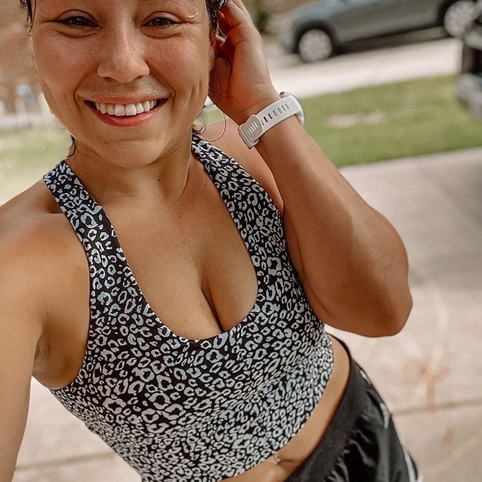 A close-up of the reviewer showcasing the black and white top.