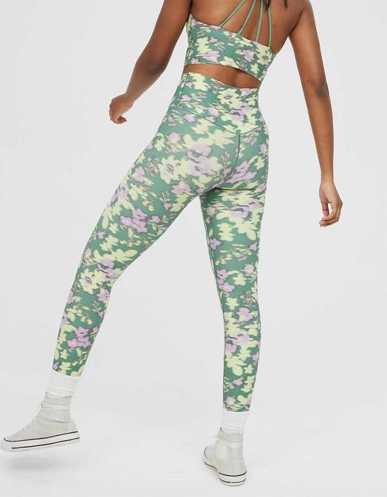 model wearing the green floral leggings