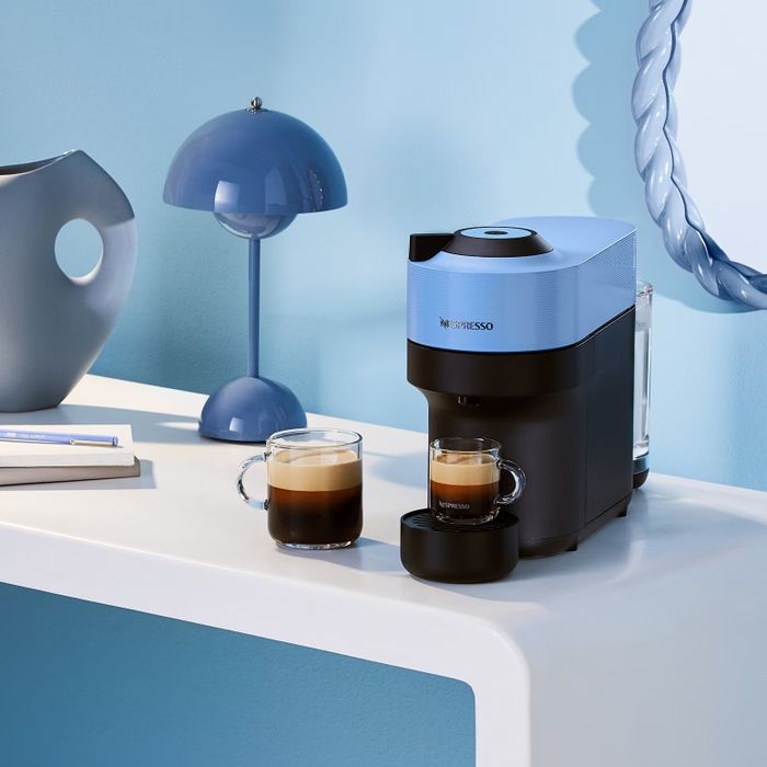 The espresso machine in a soothing light blue shade.
