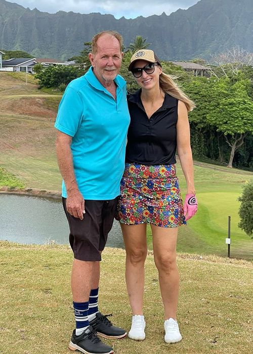 a reviewer wearing the floral skort