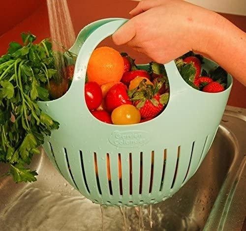 A rubber tote with drainage holes to allow water to flow through.