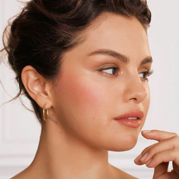 Selena Gomez rocking the Rare Beauty blush in the shade Believe