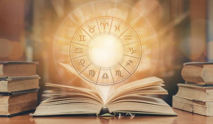 A reviewer holding the shampoo bottle