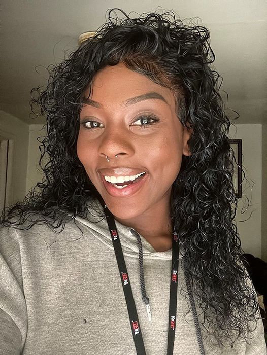 A reviewer applying the setting spray