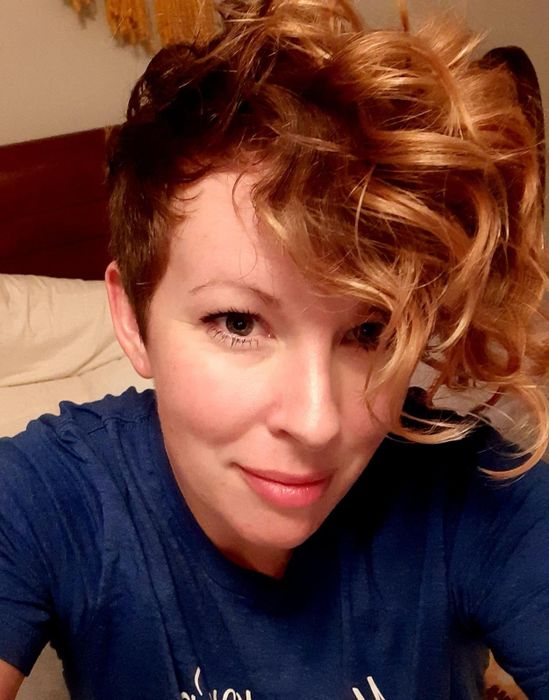 A reviewer's hair transformation after using the shampoo